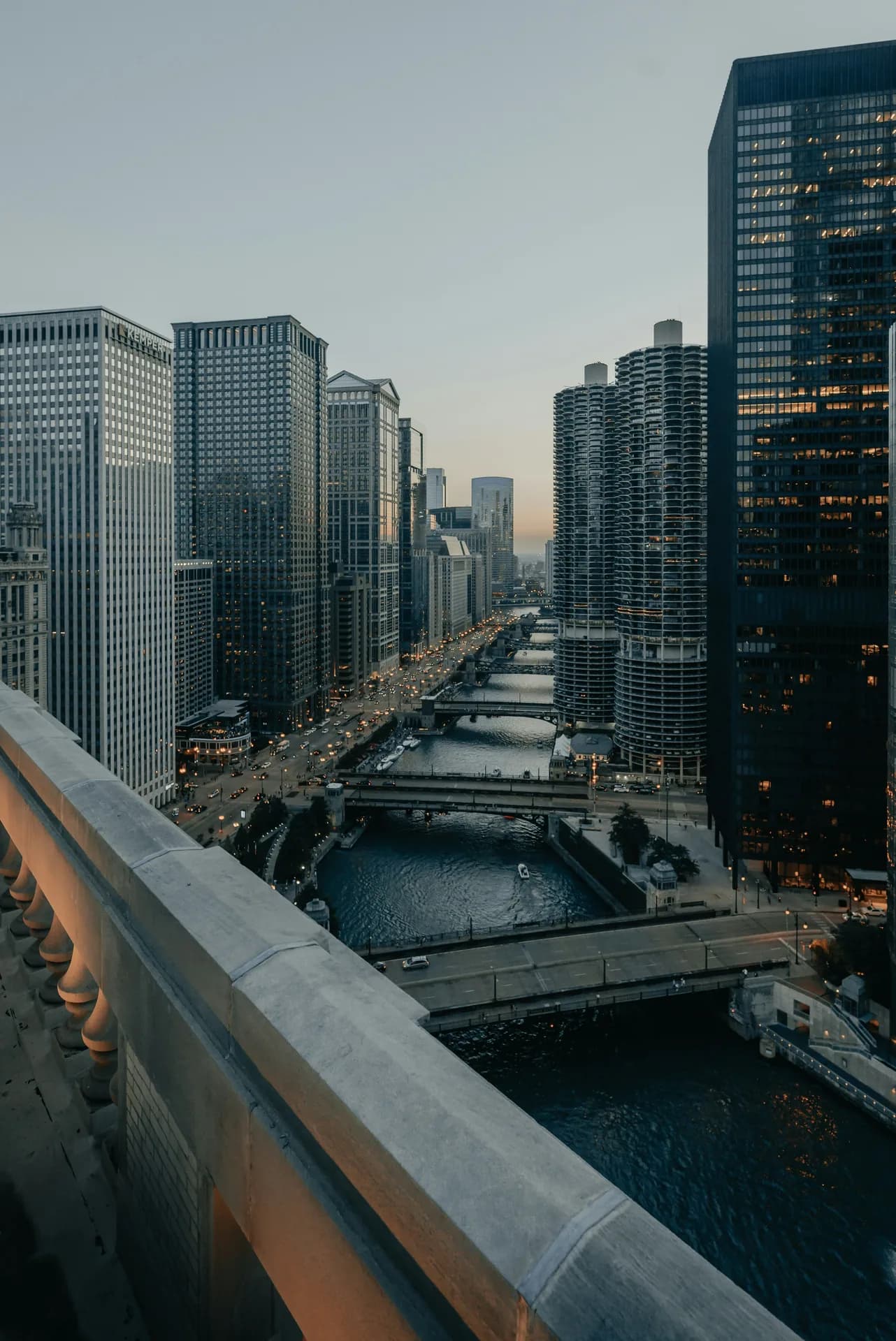 Chicago skyline along the Chicago River at dusk